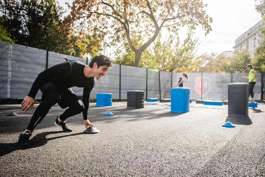 Man in black tights working out