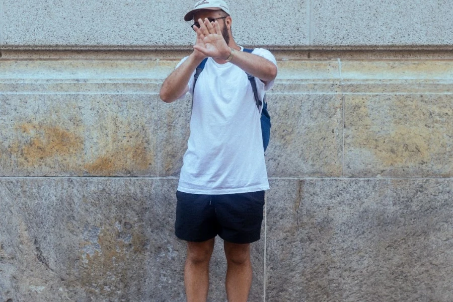 Man rocking a t-shirt and shorts combo