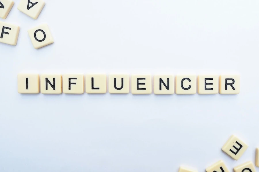 Blocks displaying the word Influencer on the floor