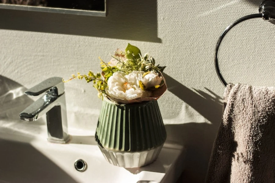 Bouquet of flowers placed on a wash basin