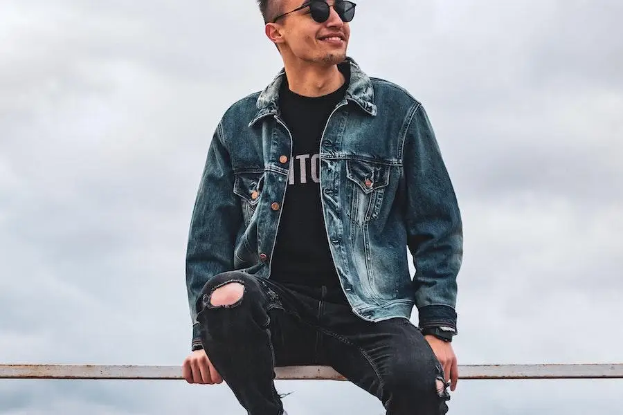 Man wearing a dark-wash denim jacket