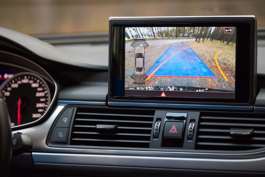 Car with parking sensors connected to visual display