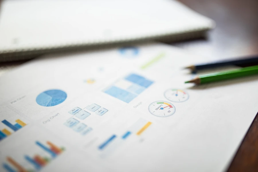 White printer paper with colorful metrics and KPIs