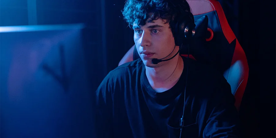 Young man in black wearing gaming headset