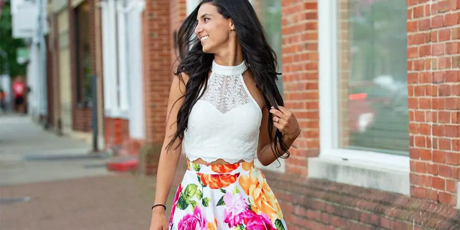Woman wearing a flared floral-print skirt