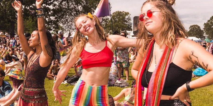 Women having fun at a festival in colorful clothes