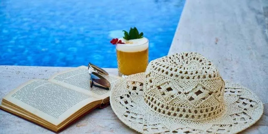 A straw hat near a pool