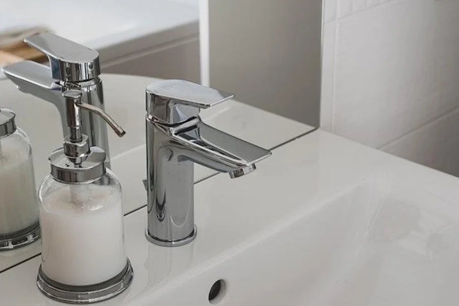 Close Up Photo Of White Ceramic Sink With Stainless Steel Faucet ?x Oss Process=style Full
