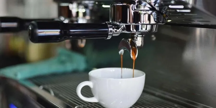 Coffee machine pouring a cup of coffee