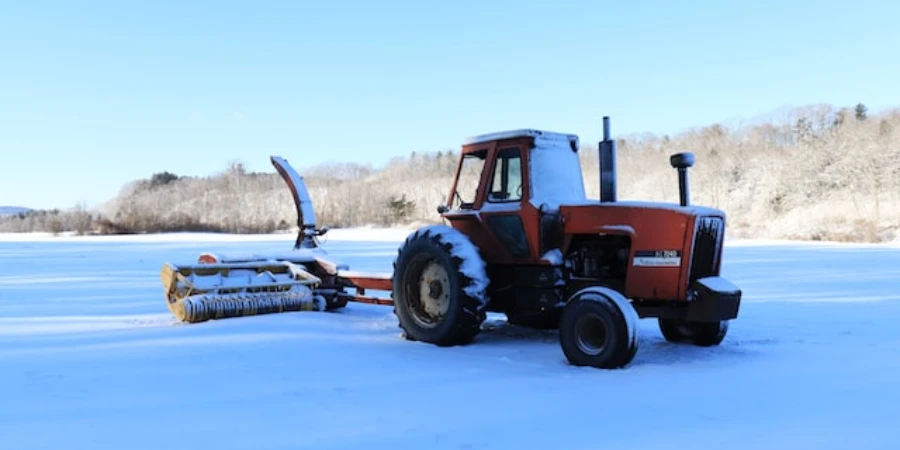 Tractor working on a snow field