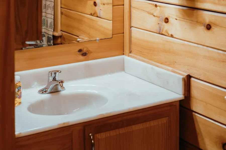 A marble sink with stainless steel faucet