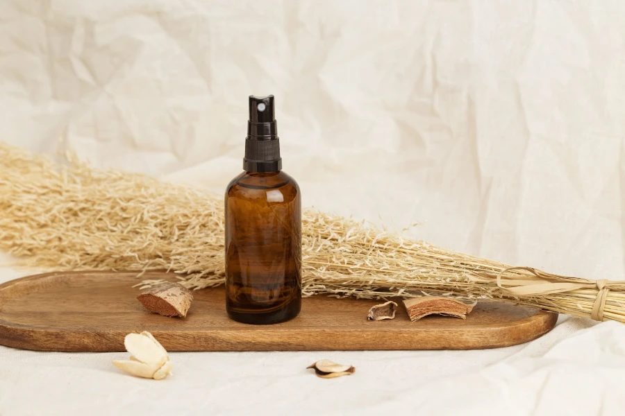 A spray bottle on a wooden board