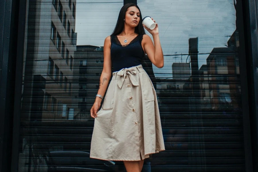 A woman wearing a practical and elegant high-waisted skirt