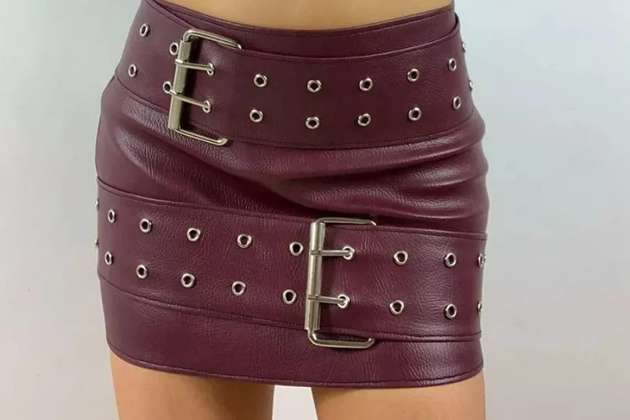 Burgundy leather belt skirt with silver buckles and holes