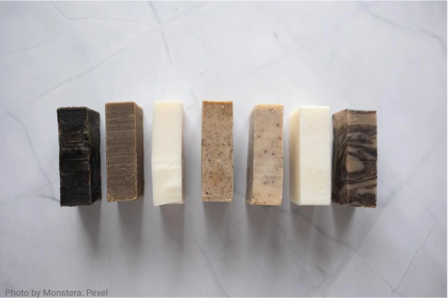 Collection of natural soaps placed on a marble table