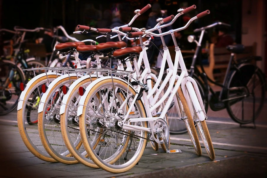 four classic bikes standing in a row