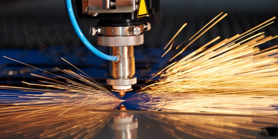 Laser cutting of metal sheet with sparks