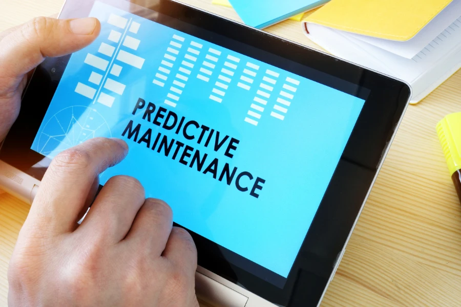 Man holding tablet with title predictive maintenance