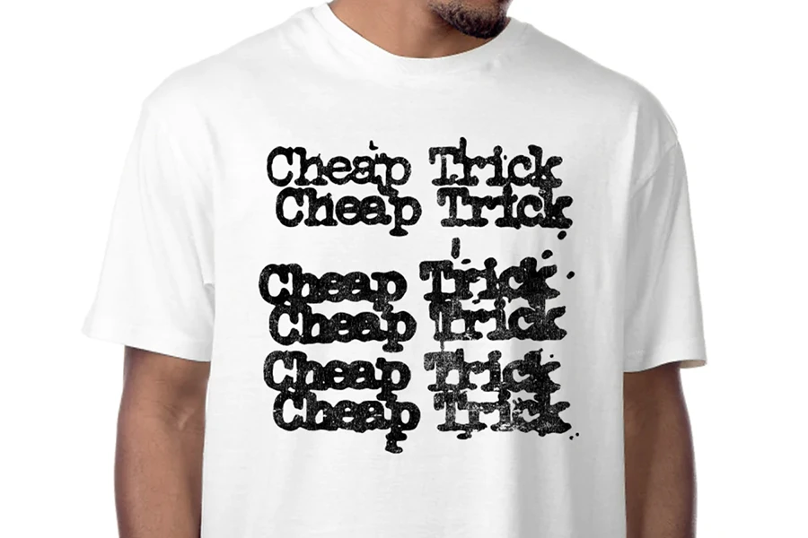 Man wearing a white tee with repeating text