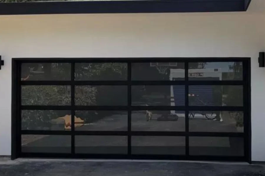 Office space with black tinted roll-up glass garage door