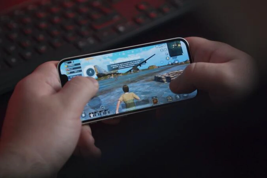 Person playing game on gaming phone