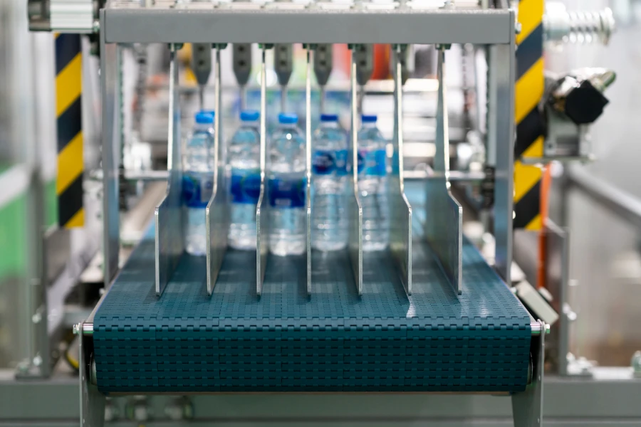 Plastic bottle labeling machine in action