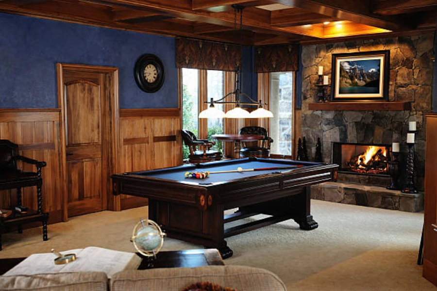Professional snooker table in a cozy wooden room