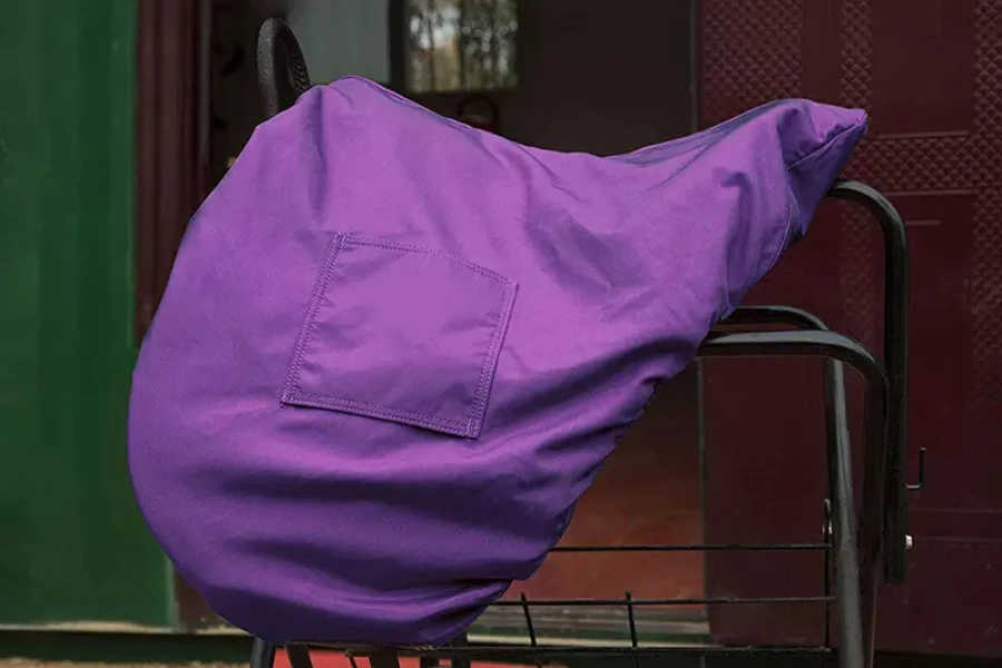 Purple waterproof saddle cover with small pocket on side
