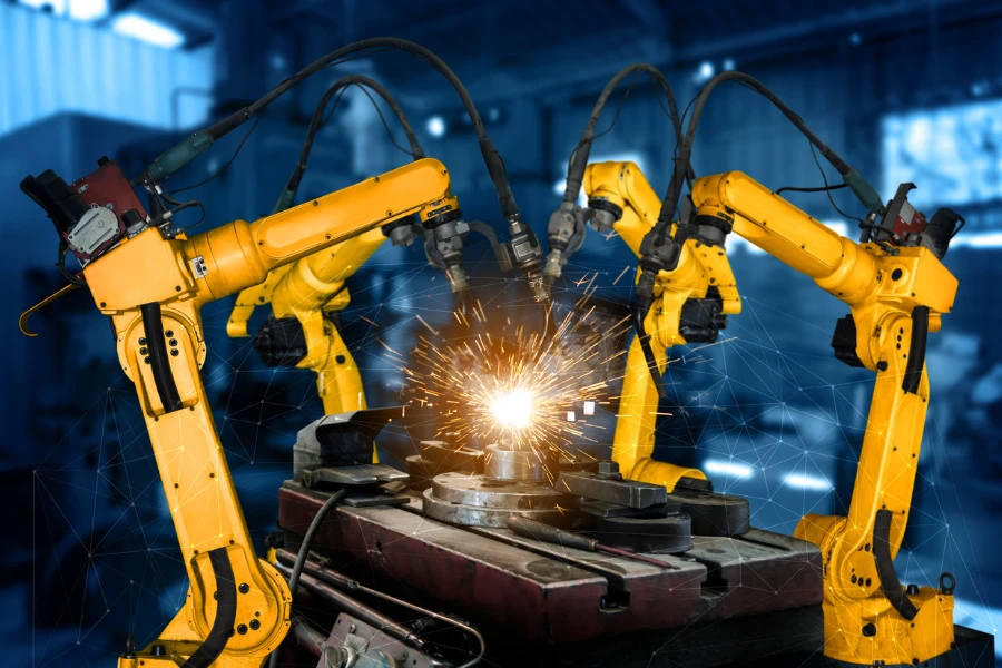 Robotic arms welding metals
