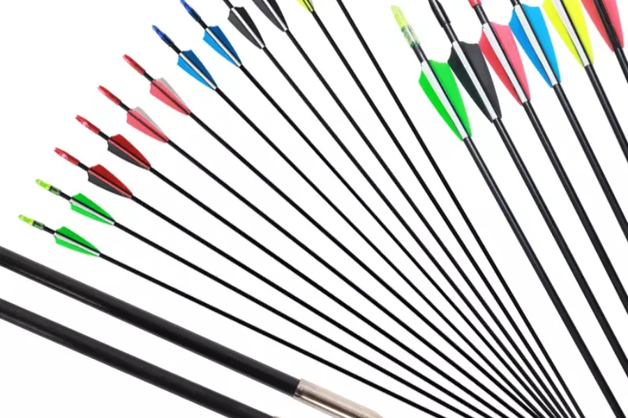 Selection of colorful fiberglass arrows on white background