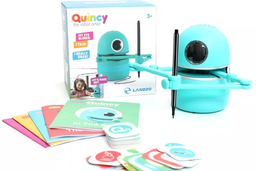 Smart drawing robot in teal color with cards in box