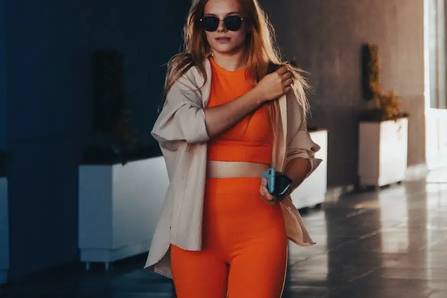 Woman rocking an orange ensemble