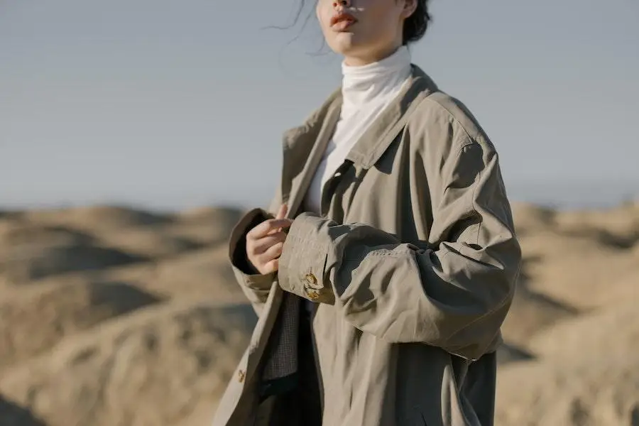 Woman wearing a grey oversized jacket