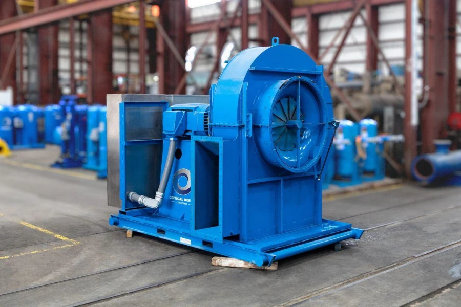 A blue centrifugal fan in use