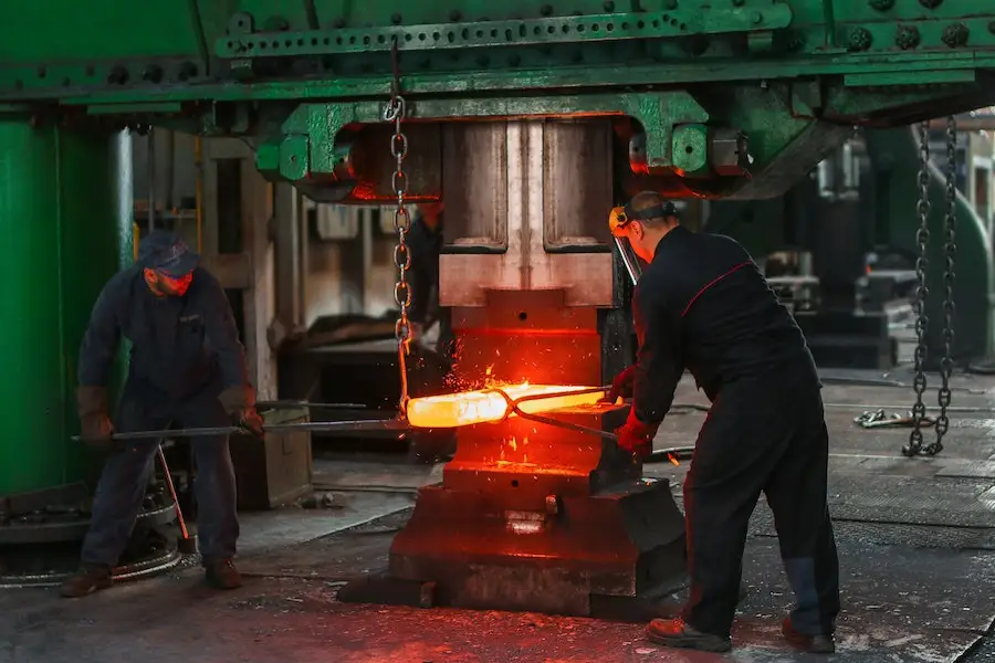 A huge industrial green hydraulic press metal forging machine