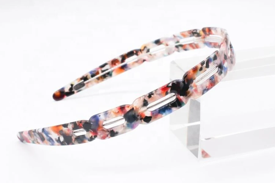 A multi-colored acetate headband