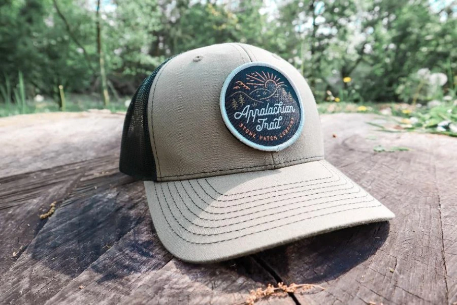 Beige trucker hat with custom patch logo