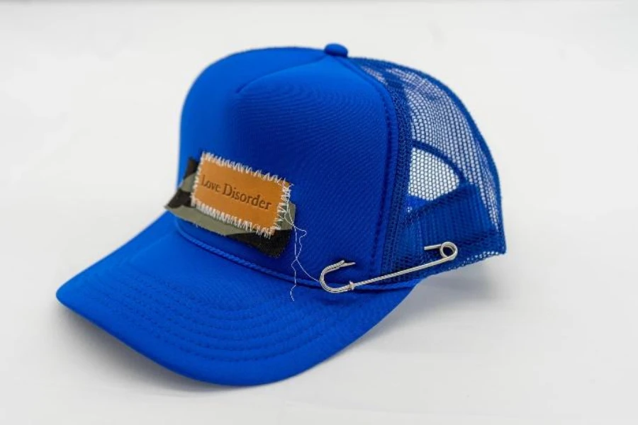 Blue mesh back cap with loose threads