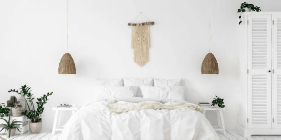 Bright room painted in white with wicker lights hanging