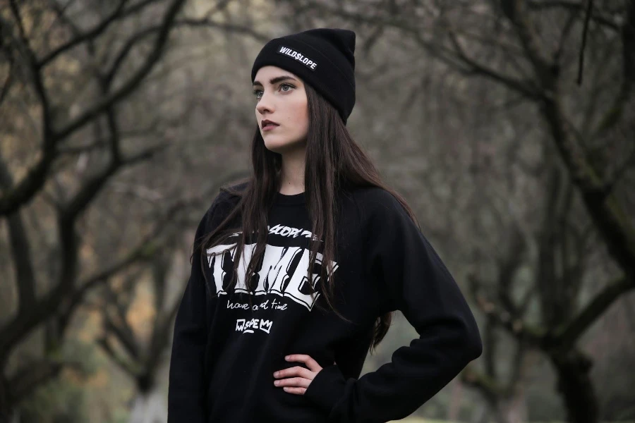 Brunette woman rocking a black beanie