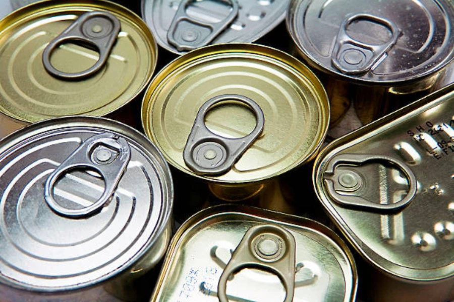 Different sizes of metal can lids that haven't been opened