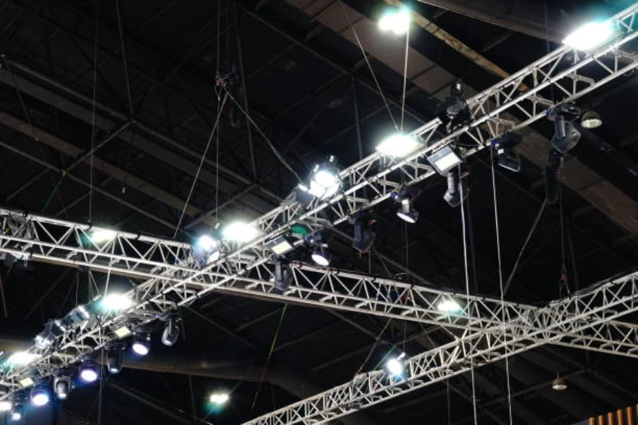 Groups of high intensity discharge lights inside a stadium