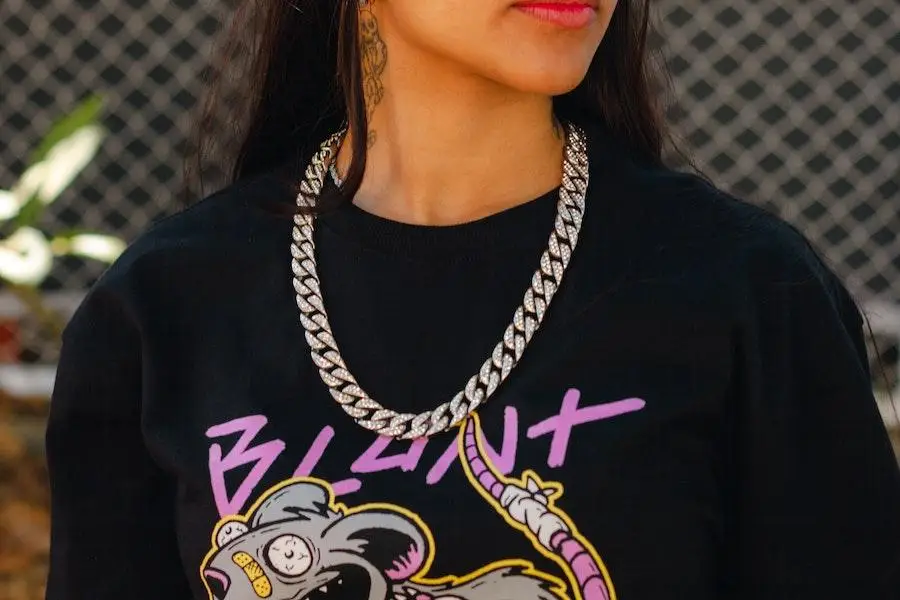 Lady wearing a black graphic tee