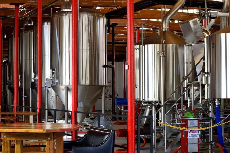 Large fermentation vessels in a factory