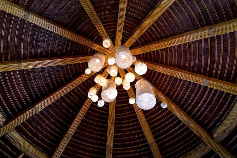 Luxurious indoor lighting fixtures hanging from a ceiling