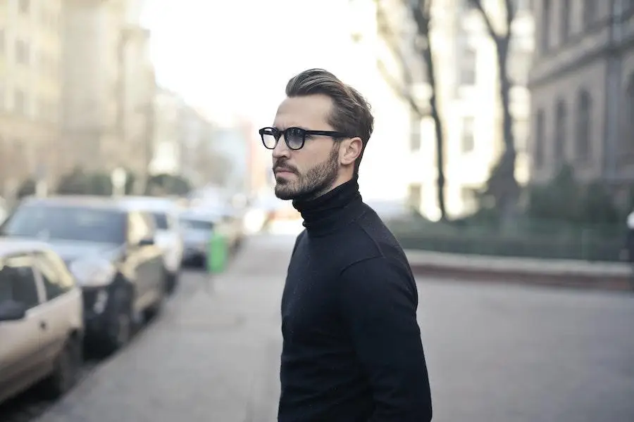 Man in glasses rocking a black turtleneck