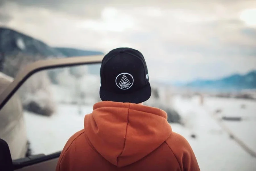 Man wearing a custom-designed hat