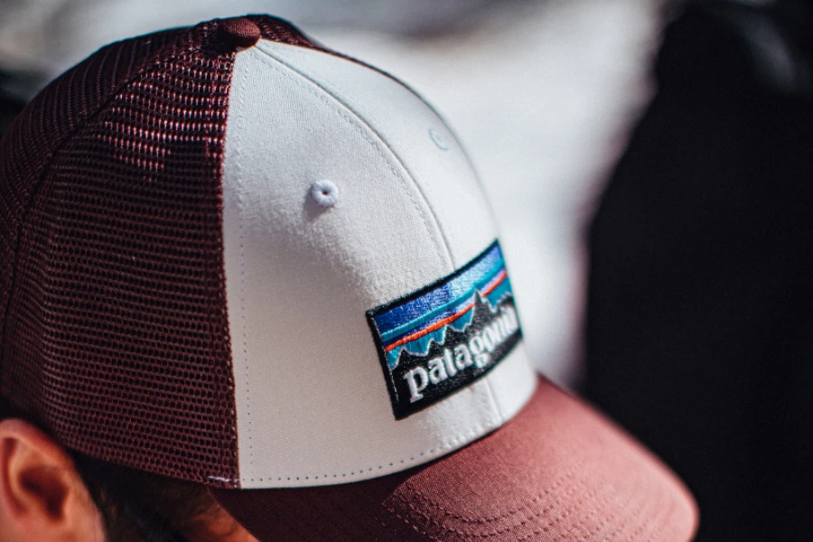 Maroon and white trucker cap with tall crown