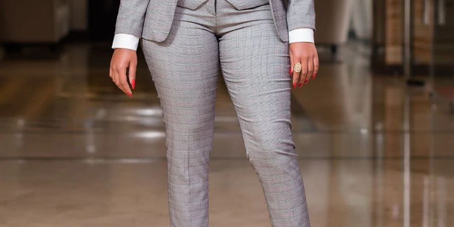 Woman rocking a pair of sophisticated gray trousers