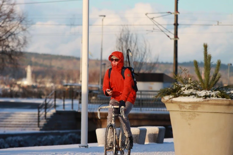 Woman wearing a team windbreaker